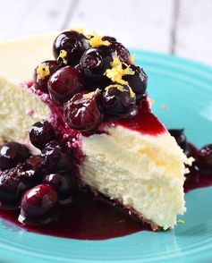 Vanilla Bean Cheesecake with Blueberry Lemon Sauce